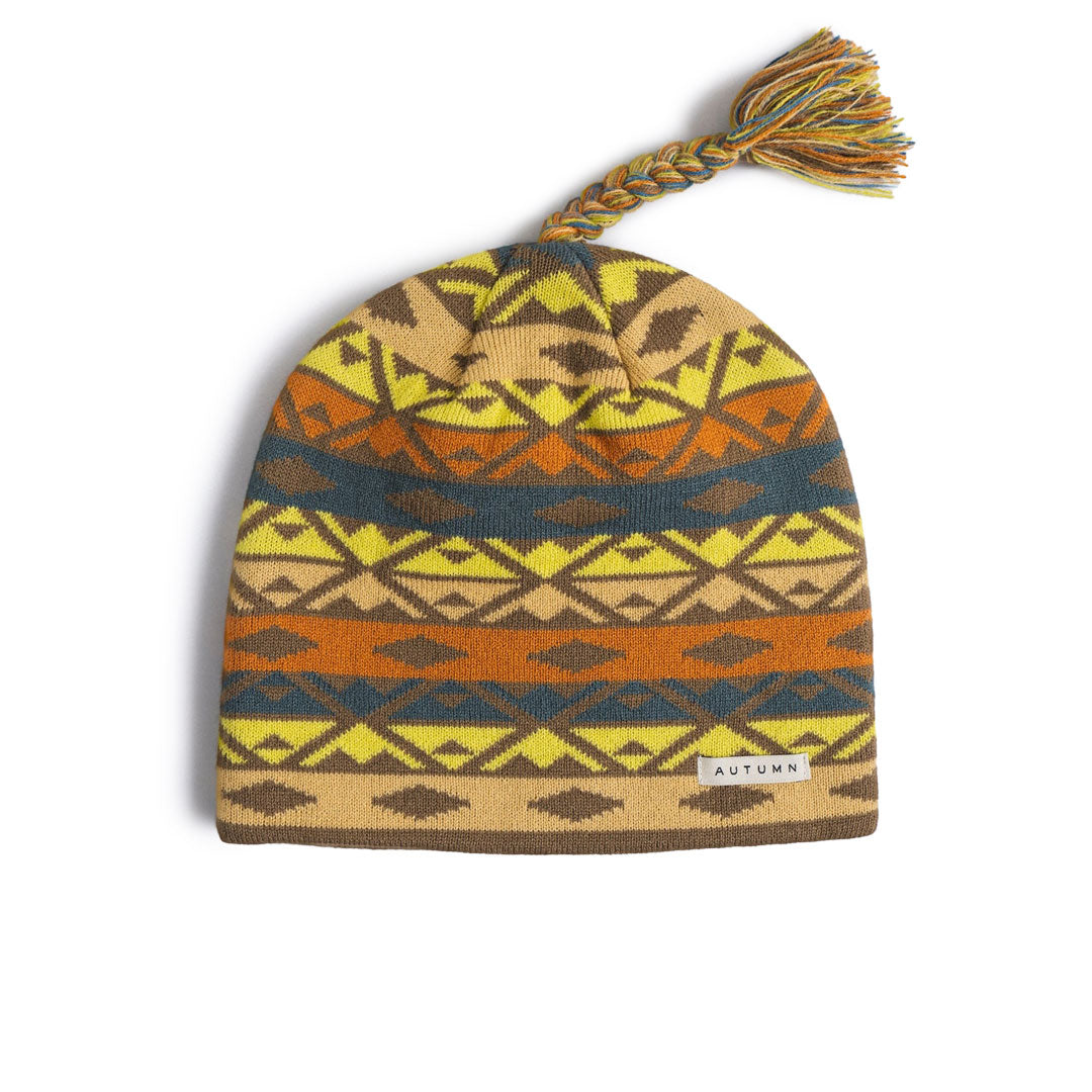 PISTE TASSLE BEANIE / DARK SAND