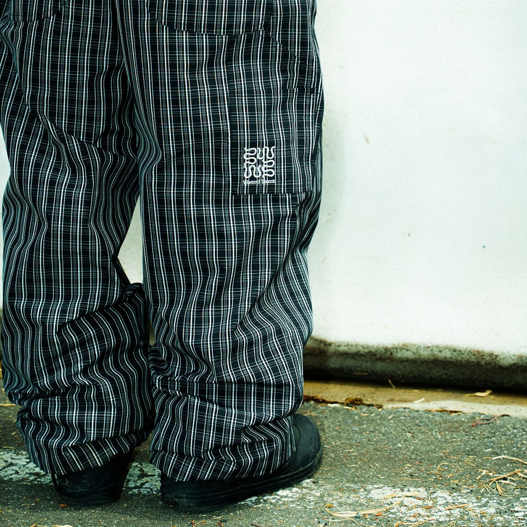 NOMADIK X WASTED TALENT OUTERWEAR PANTS 2026 / GREY CHECK