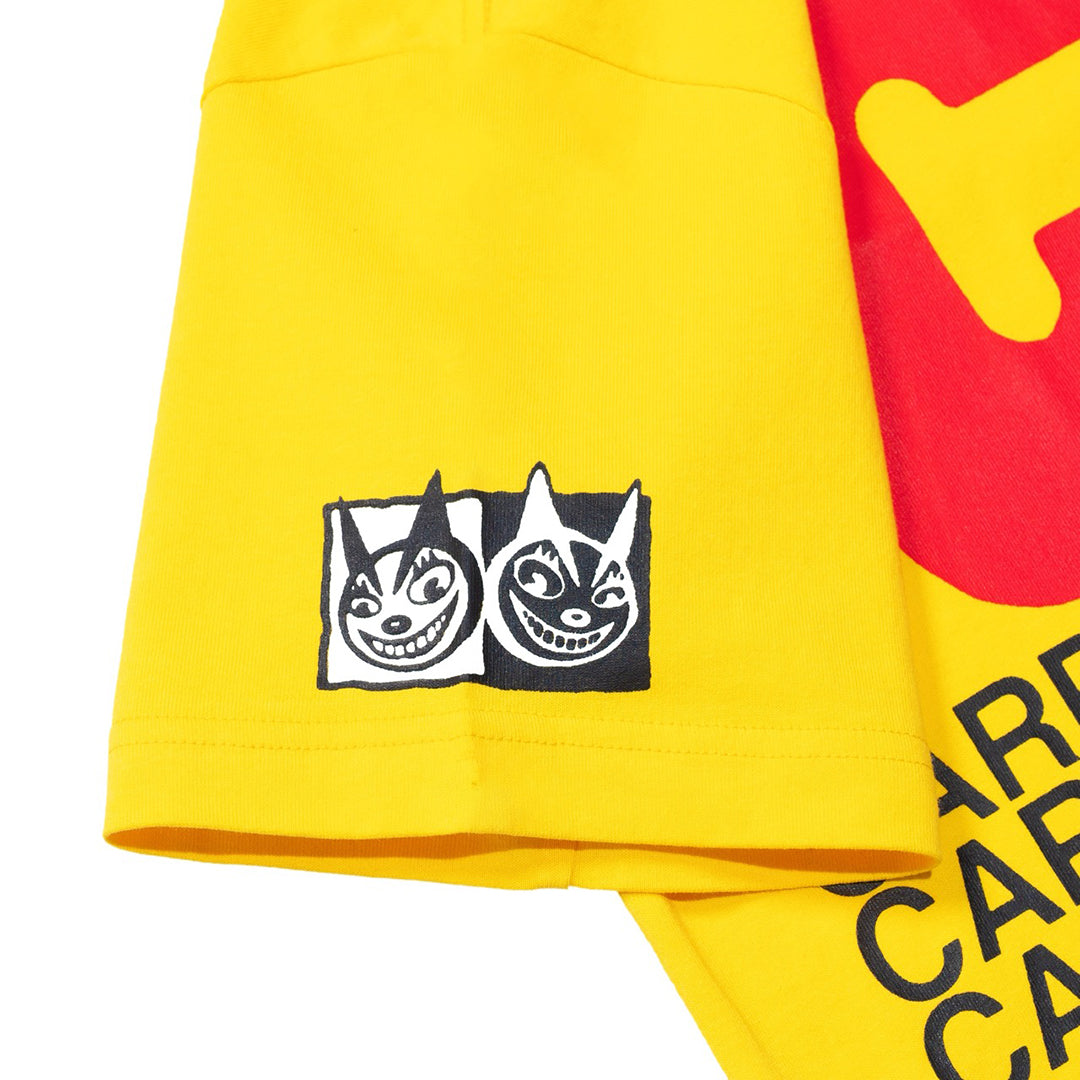 CARPET COMPANY（カーペット カンパニー）| C.C. SUCKS TEE / YELLOW