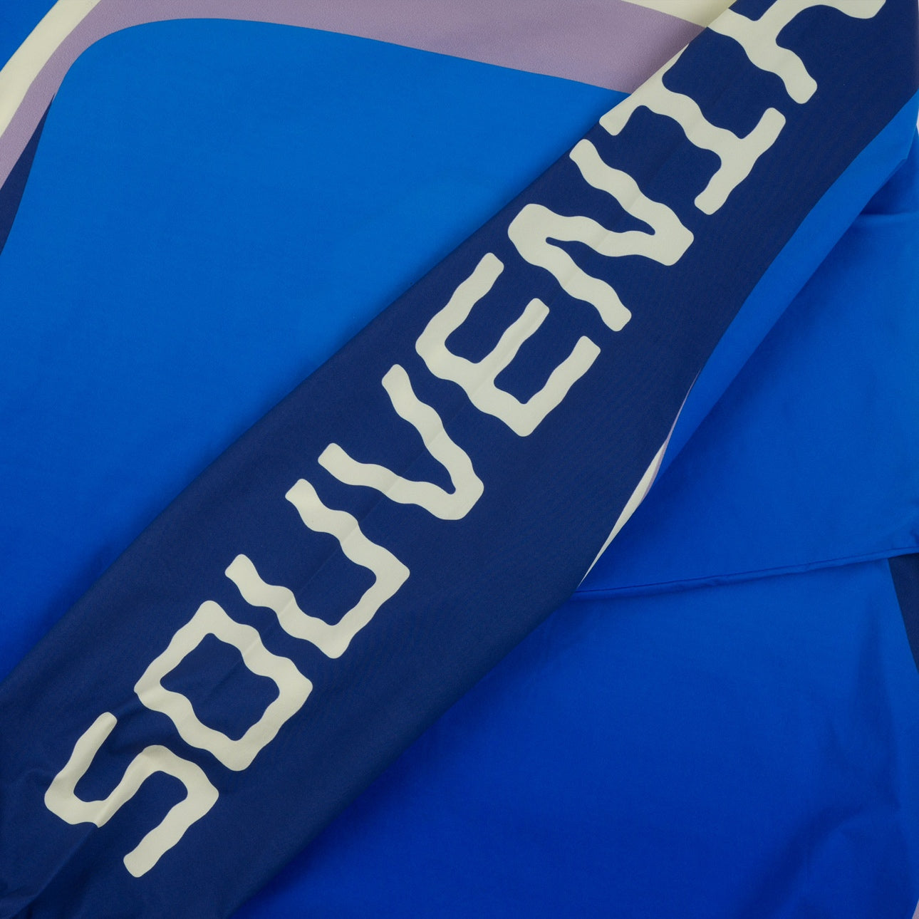 SOUVENIR SNOWBOARDING （スーベニア スノーボーディング）| SOUVENIR X HOWL WINDPROOF STRETCH MOTO SHIRT 2026 / SKY BLUE | スノーボード・スケートボードのTACTICS JAPAN